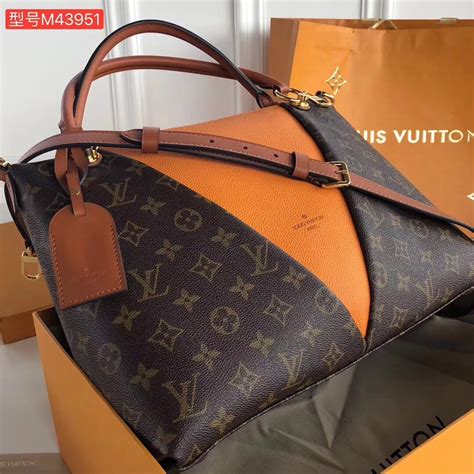 louis vuitton carryall mm review